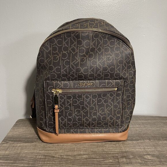 Calvin Klein Women’s Brown Two Layers Medium Zip CK Logo Backpack HIAKJPA2 - Picture 1 of 10
